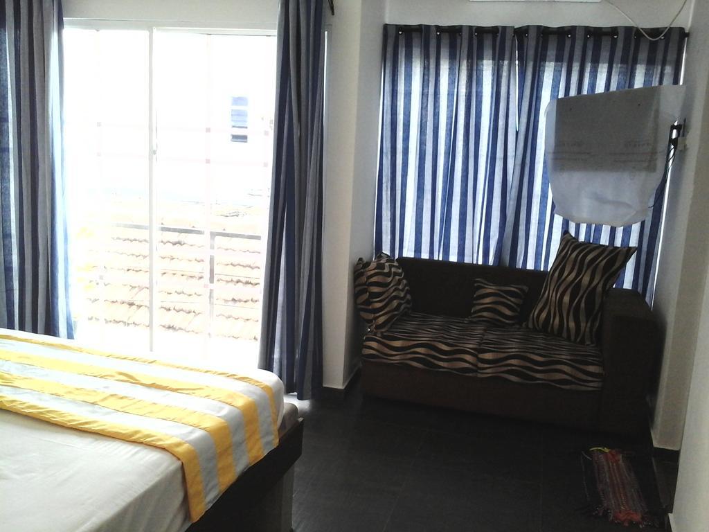 Petit Guest House Negombo Værelse billede